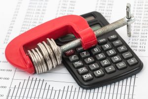 Sylvan Beach Debt Refinancing Canva Coins and Calculator on a Invoice 2 300x200